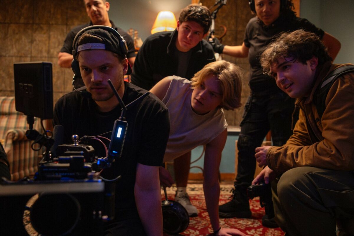 Alex Burgess on film set - Houston Video Production Media Feature